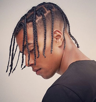 Young black man with braided hair