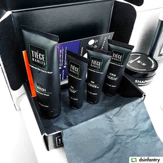 Open box showing Tiege hanley products