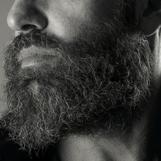 Black and white image of man with beard