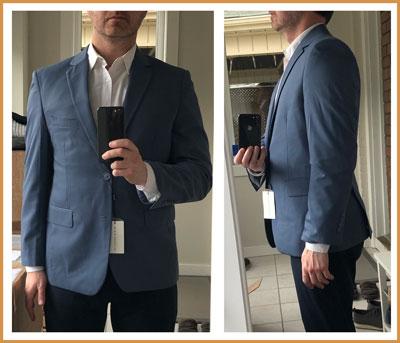 Blue Alain Dupetit suit in the mirror