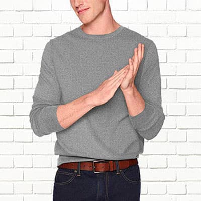 man wearing gray crew neck sweater