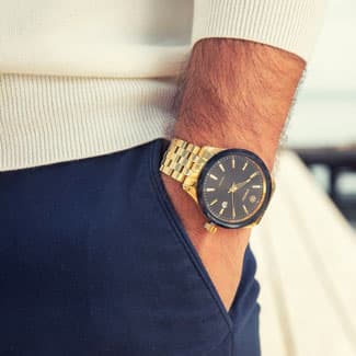 Man wearing gold Jowissa watch