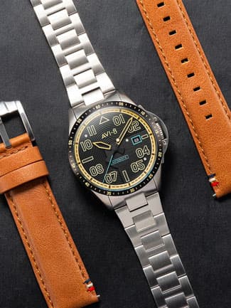 the Jubilee Automatic Limited Edition Reigate from AVI-8 next to leather watch straps