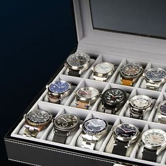 Black watch case full of watches