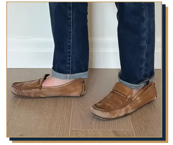 Dave Bowden wearing blue jeans and brown leather driving shoes from Allen Edmonds