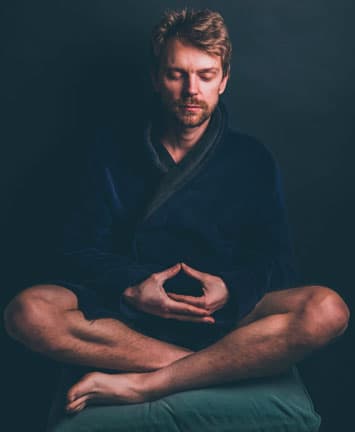 Man meditating with legs crossed