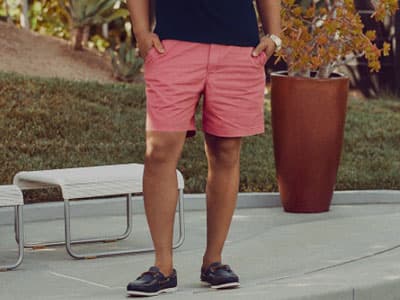 Man wearing shorts and boat shoes 