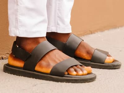 Man wearing sandals with no socks