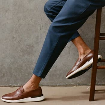 Man wearing brown Wolf and Shepherd Crossover Loafers