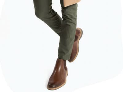 Man wearing chinos and chelsea boots