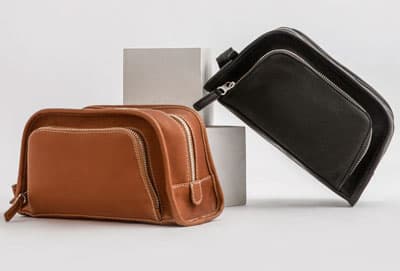 Two leather dopp kits