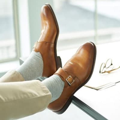 Man wearing khakis and monk strap shoes
