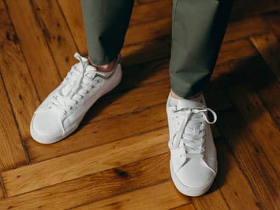 Man wearing white sneakers