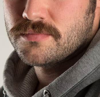 Man's chin with beardstache