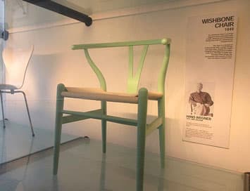 Wishbone chair on display in museum