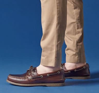 man wearing boat shoes and khakis