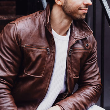 man in brown leather jacket