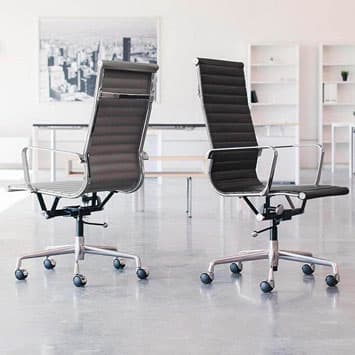 Replicas of the Eames aluminum group office chairs