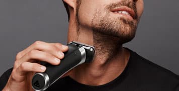 Man shaving with foil shaver
