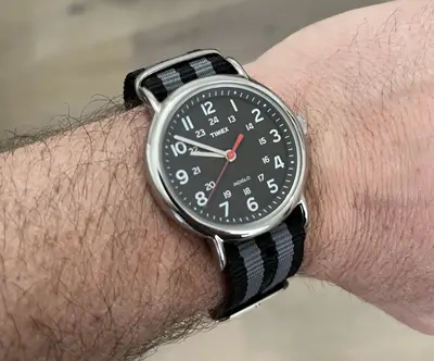 Close up of Dave Bowden wearing a black Timex Weekender with black and gray Nato Watch Strap