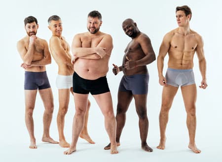 Diverse group of men wearing boxer briefs
