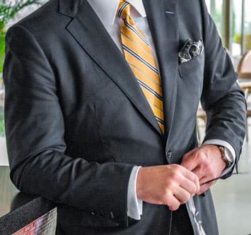 Man wearing grey suit 