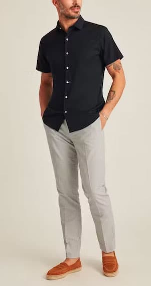 Man wearing short sleeve shirt and loafers