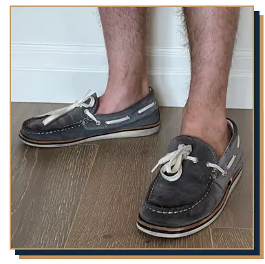 Irreverent Gent founder Dave Bowden modelling gray suede boat shoes