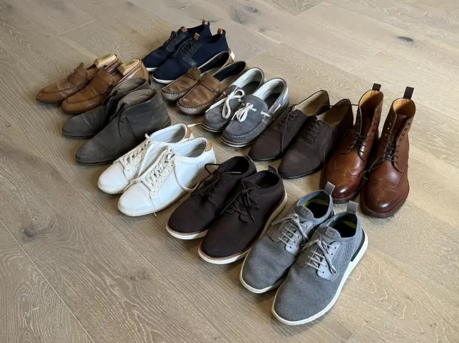 Overhead of various casual shoes owned by Dave Bowden