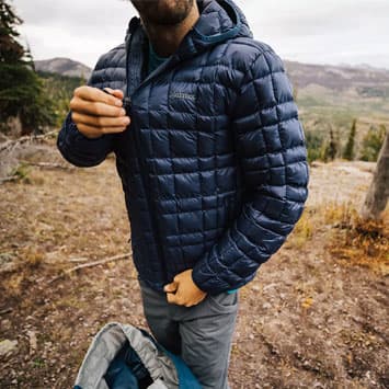Man outside wearing a Marmot jacket