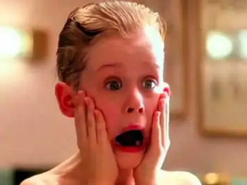 Screenshot of Kevin in Home Alone trying aftershave