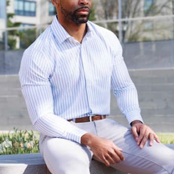 Man wearing athletic fit dress shirt