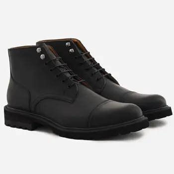 Black combat boots by Beckett Simonon