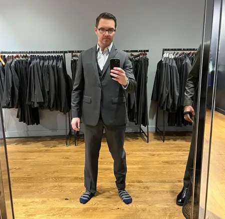 Selfie in mirror during first stage of Indochino fitting