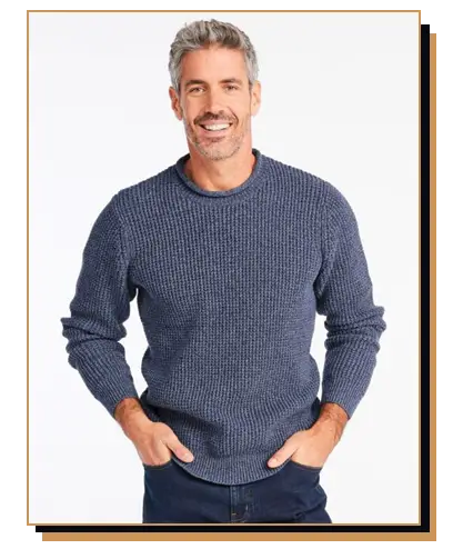 Man wearing a blue roll neck sweater