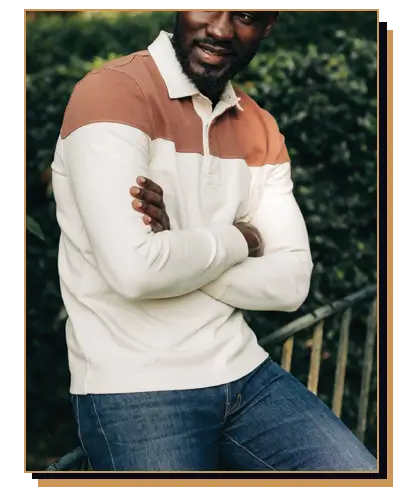 Man wearing a rugby shirt with arms crossed