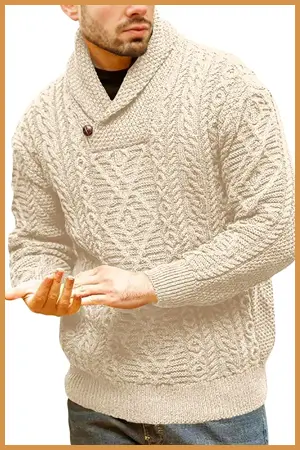 Man wearing a thick, cream-color shawl collar pullover