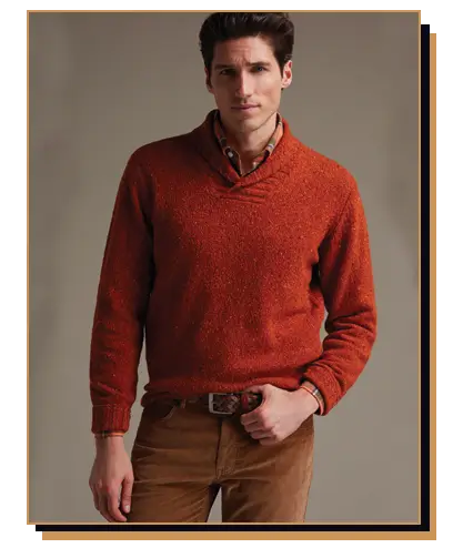 Man wearing a red shawl collar pullover sweater