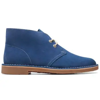 Blue suede chukka boots by Clarks