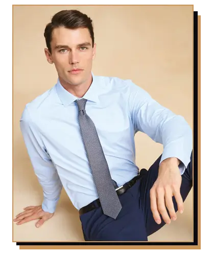 Man wearing light blue dress shirt and tie