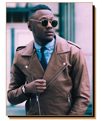 Man wearing a brown leather jacket and blue shirt