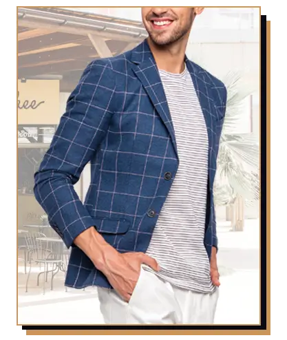 Man wearing checkered blue blazer and striped tee