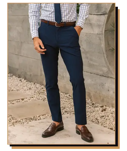 Man wearing navy pants and loafers