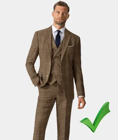 Man wearing brown three piece suit in vintage style