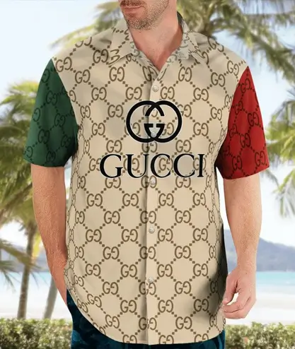 Man wearing patterned gucci shirt