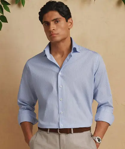 Man wearing light blue dress shirt