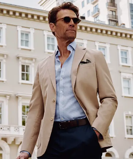 Man wearing khaki blazer