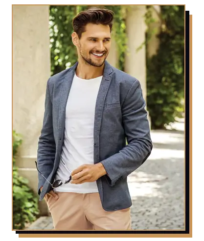 Man wearing grey blazer and white tee