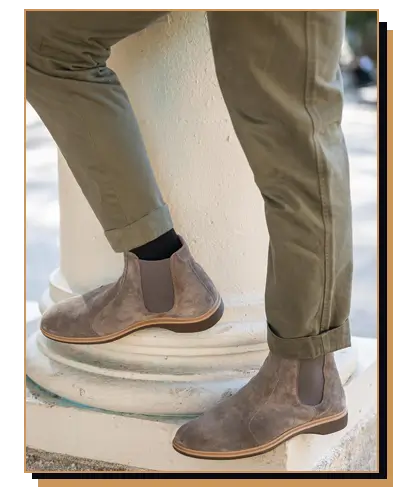 Man wearing suede chelsea boots