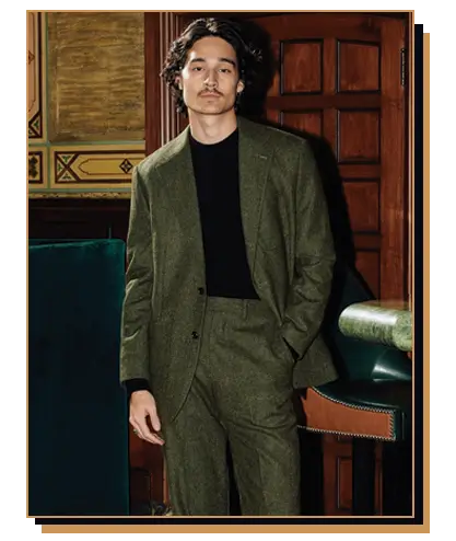 Man wearing green suit